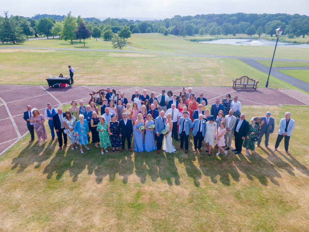Aerial view of wedding guests at Carden Park.