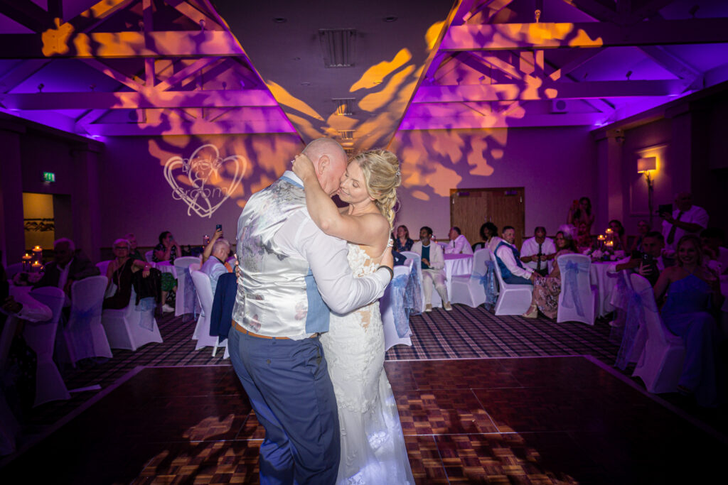 Bride and groom first dance at wedding reception at Carden Park 