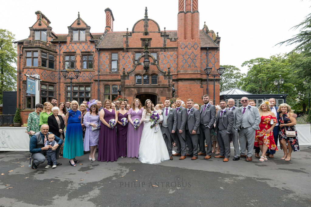 Wedding guests posing at Chester Zoo wedding