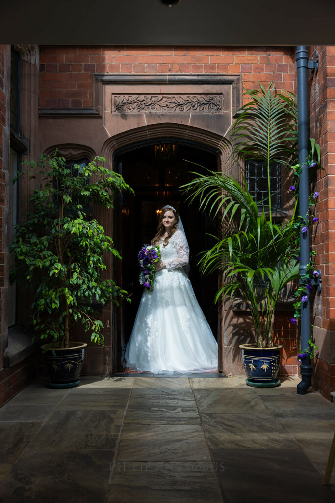 Bride in white dress at Oakfield restaurant Chester Zoo wedding