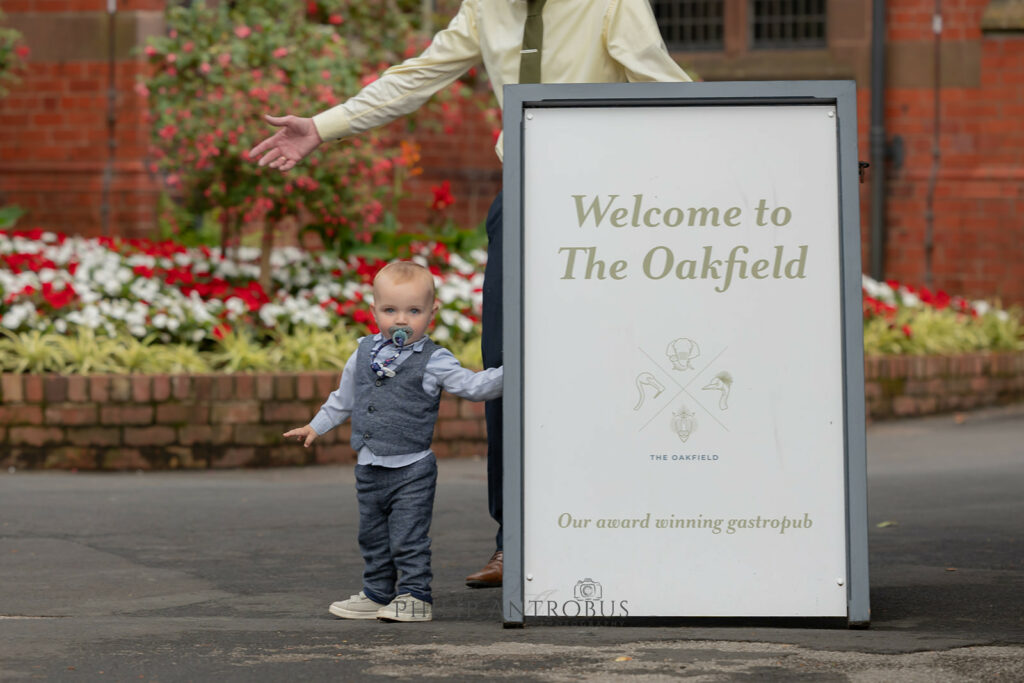 Little boy in waistcoat at wedding in Chester Zoo.