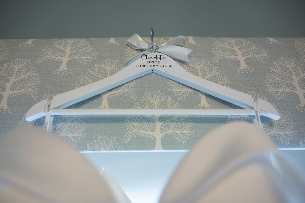 Personalised wedding dress coat hanger.